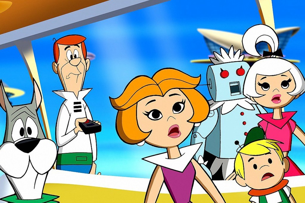 “The Jetsons.” The characters are depicted with exaggerated expressions. The image is colorful and has six characters from “The Jetsons” in it. George Jetson, the father, is on the left side holding a remote control. Jane Jetson, the mother, is in the center wearing a purple dress and has an open-mouthed expression. Judy and Elroy, their children, are also present; Judy wears pink and Elroy wears green. Astro, the family dog with a blue collar, is at the bottom left of the image. Rosie the Robot Maid is on the right side of Jane; she’s grey with red buttons and white arms. The background shows a futuristic cityscape with blue skies.